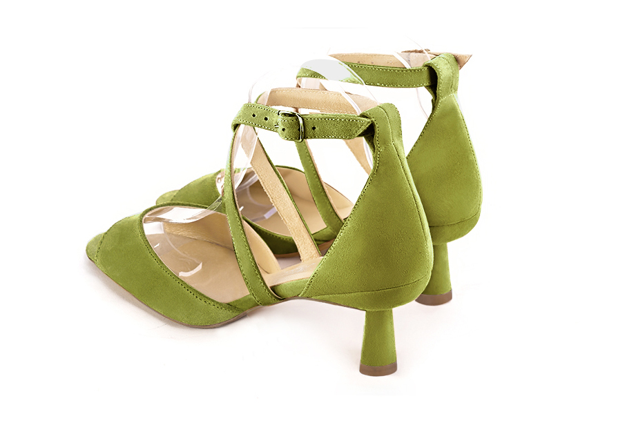 Women's pistachio green elegant sandals closed at the back with crossed straps. Square toe. Medium spool heels - Rear view